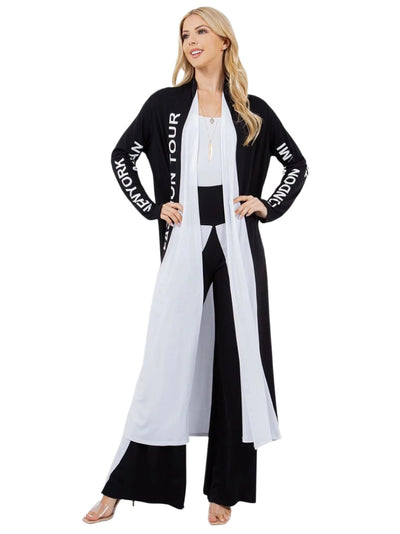 Woman wearing a black and white outfit with 'New York' text on a white background