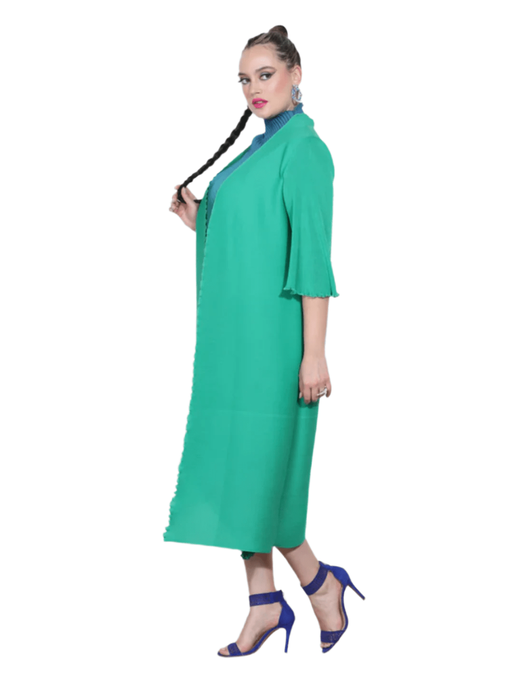 Woman wearing a green dress with a white background